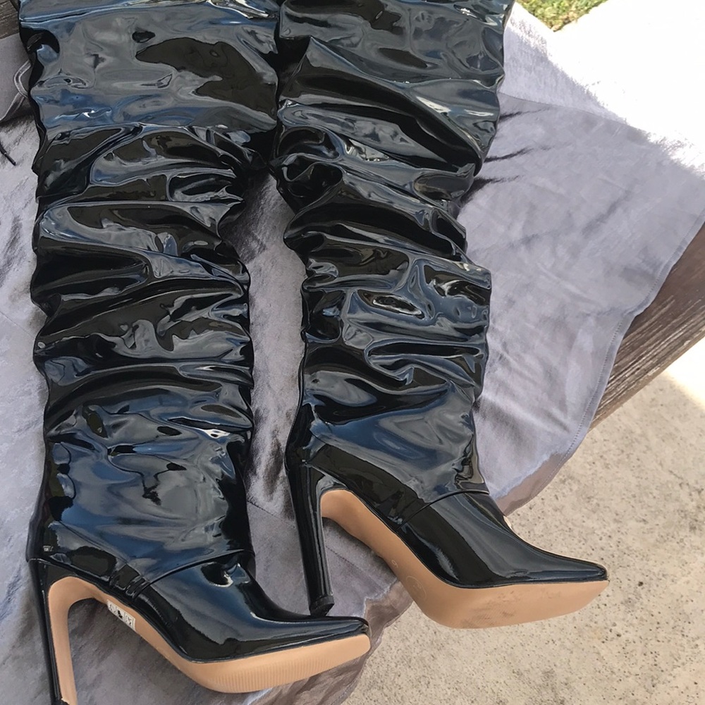 Thigh high black boots size 6